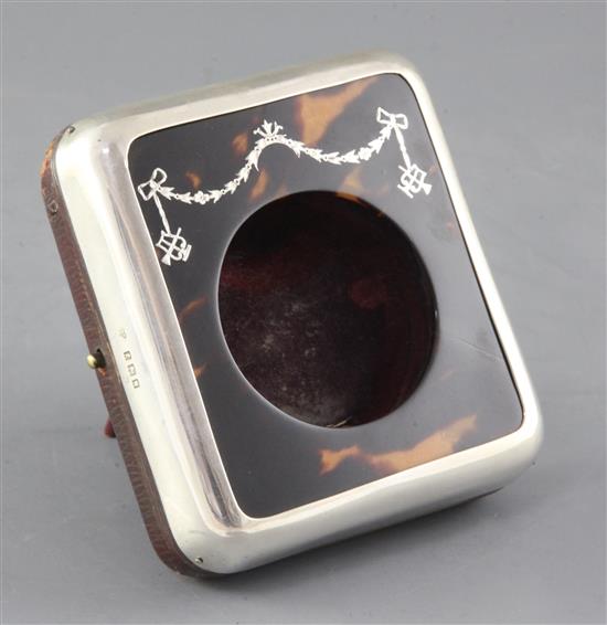 A George V silver and tortoiseshell pique mounted travelling watch case by Charles & Richard Comyns, London, 1920, 11.4cm.